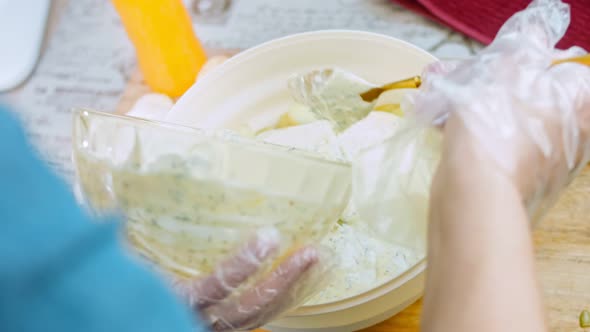 The Chef Pours the Mayonnaise and Mustard Sauce Over the Boiled Potatoes