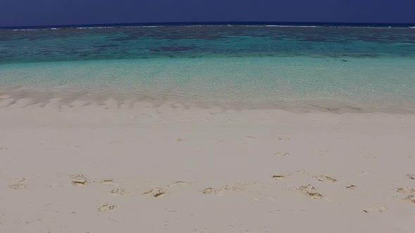 Warm travel of bay beach voyage by blue sea and sand background near surf