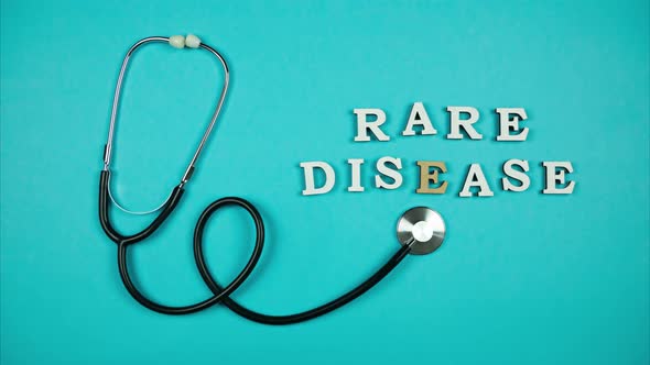 Stethoscope Moves by Letters Taking Away the Letters of the Phrase Rare Disease. Stop Motion