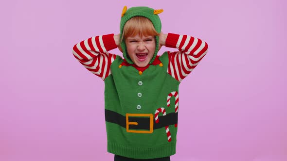 Girl Kid Christmas Elf Covering Ears and Gesturing No Avoiding Advice Ignoring Unpleasant Noise