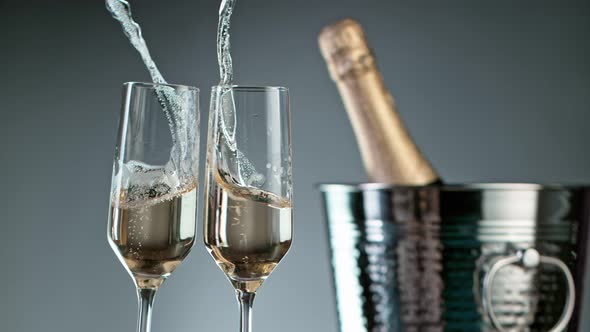 Super Slow Motion Shot of Clinking Two Glasses of Champagne at 1000Fps
