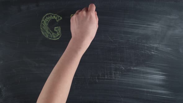 Colorful Chalks are Written the Words Girl Power on a Chalkboard Timelapse