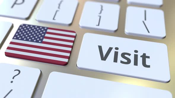 VISIT Text and Flag of the United States on Keyboard