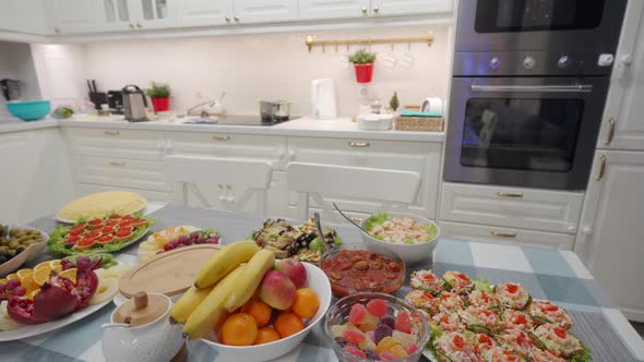 Family Celebration Dinner in the Kitchen Festive Table Served with Delicious Dishes for Family