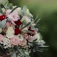 Wedding bouquet in the hands of a beautiful bride, bride holding big wedding bouquet on wedding - VideoHive Item for Sale