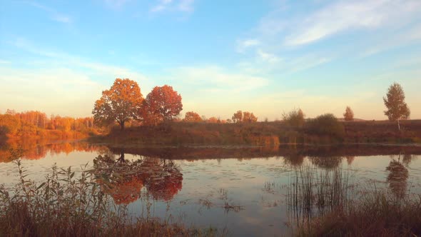 Beautiful Autumn Landscape, Calm Water and Trees.