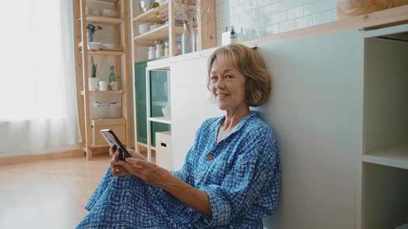 woman spending time in her cozy apartment