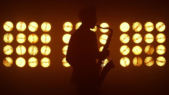 Unknown Jazz Man Saxophonist Performing on Stage