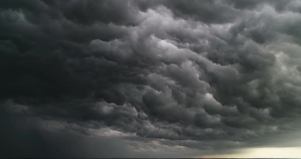 Aerial Dark Ominous Grey Storm Clouds. Dramatic Sky. Lighting In Dark Stormy Clouds alt