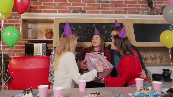 Excited Girl, Surrounded By Sincere Friends, Opening Birthday Presents, Young Beautiful Brunette