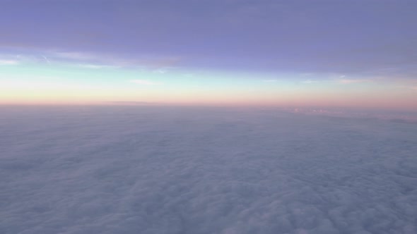 Aerial view to beautiful clouds from the airplane.
