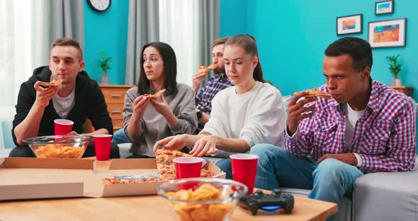 Diverse People Friends Got Together to Eat Pizza at Home