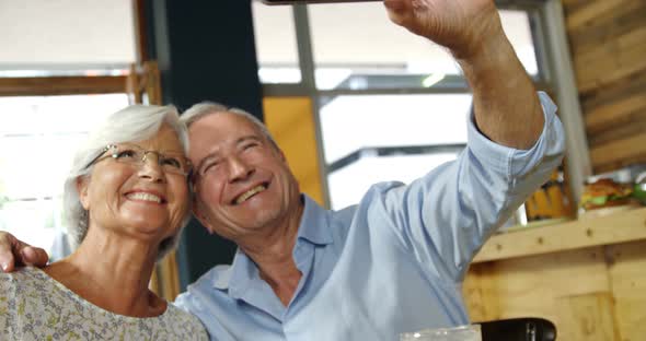 Senior Couple Taking a Selfie in The Cafe 4k