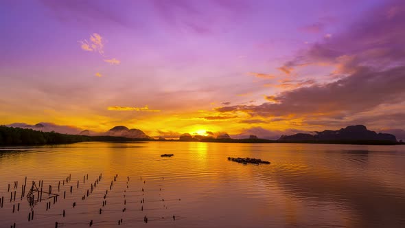 Time Lapse nature Beautiful Light sunrise sky colorful clouds scenery. Sky with reflection on sea