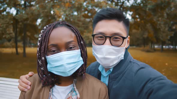 Young Diverse People Taking Selfie Outdoor Wearing Protective Face Masks