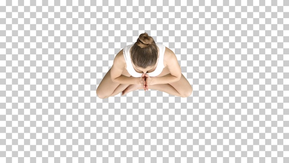 Young woman meditating in Lotus Pose, Alpha Channel