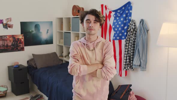 Guy Posing in Dorm Room