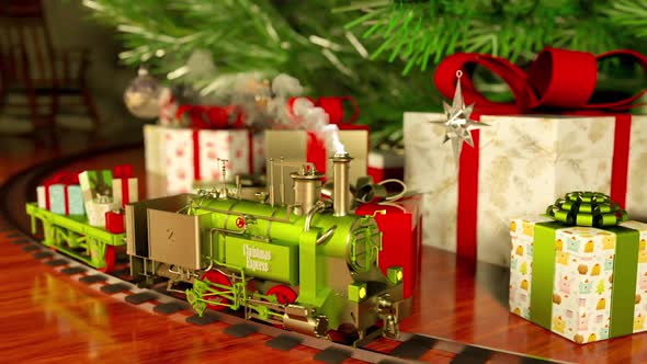 Toy train running around Christmas Tree