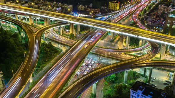 Timelapse of busy traffic road with modern office building in hangzhou china