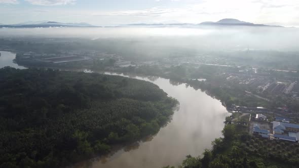 Aerial view Kerian river in misty day