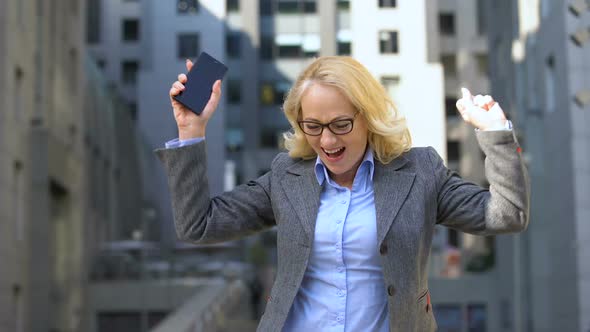 Happy Office Worker Dancing Celebrating Good News, Career Achievement, Success