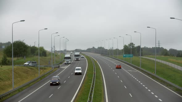 Cars Passing On The Highway Rainy Day 1