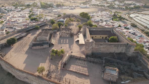 Spectacular aerial shot orbiting the great Moorish medieval castle, Castro Marim, Algarve, Portugal.