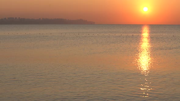 Beautiful Seascape: Sun Over the Sea Near the Shore