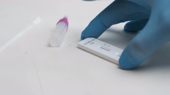 Preparation to Rapid Antigen COVID19 Test By Laboratory Worker