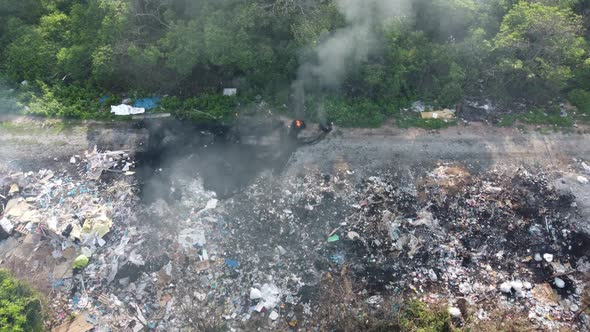 Aerial view burning of trash.