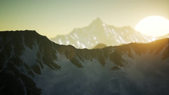 Winter Landscape in Mountains at Sunset