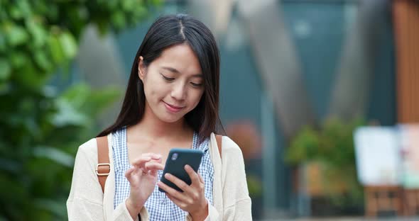 Woman use of mobile phone