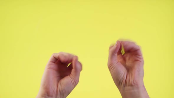 Woman Hands Waving, Dancing Snaps Her Fingers To Music Rhythm Gesture Isolated Over Yellow