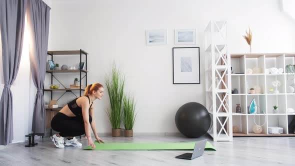 Sport at Home Internet Workout Woman Stretching