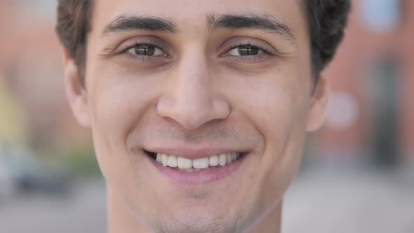 Outdoor Close up of Smiling Young Man