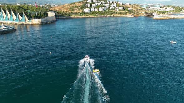 Sports Boat Sails Fast on the Sea Aerial View 4 K