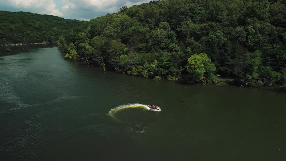 Aerial Photography is an Epic Shot of Jet Ski Racing on a Large River