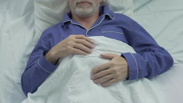 Old Man Sweetly Sleeping in Bed, Turning Over on Other Side, Enjoying Comfort