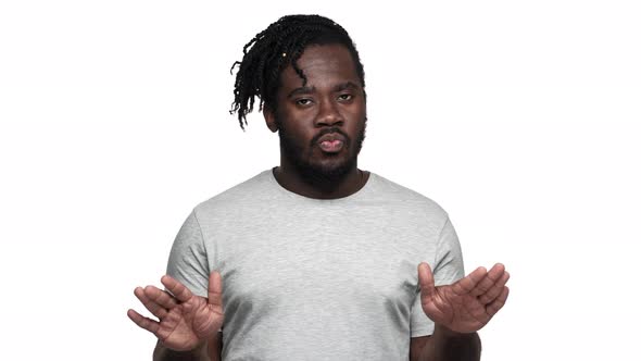 Portrait of Determined and Strict Afro Man in Basic Tshirt Shaking Fingers Meaning No and Gesturing