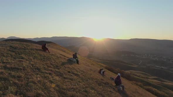 Travelers Enjoying the Sunset in Mountains Conception The People Enjoying with the Existing Idyllic