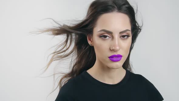 Portrait of Woman with Purple Lips