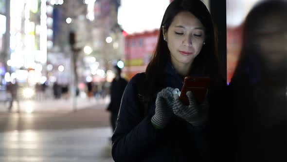 Young woman with mobile phone