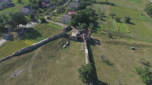 Aerial of ruins near a village