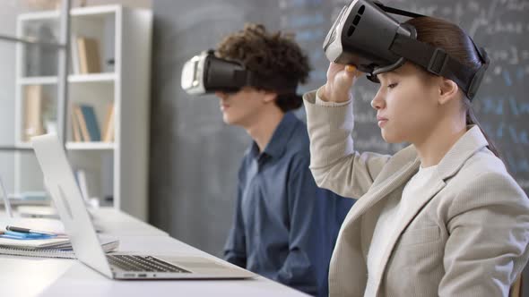 Students Using VR Glasses At Class