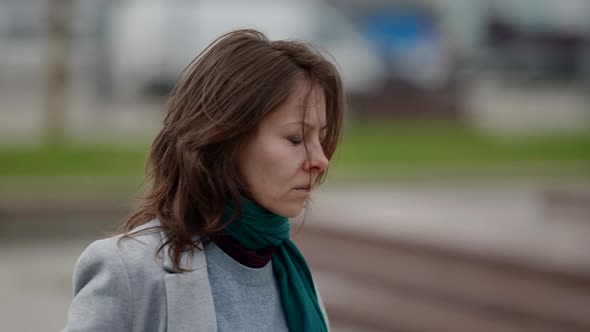 Depressed Woman is Walking in City Townswoman in Depression is Strolling Alone on Streets