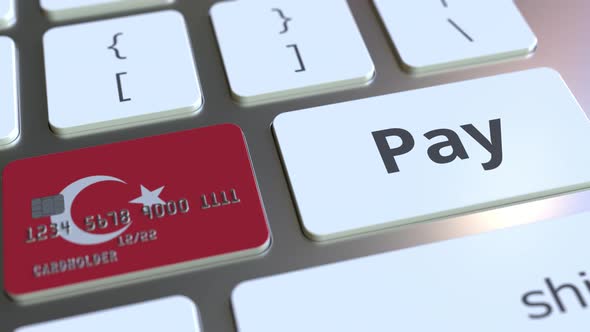 Bank Card with Flag of Turkey As a Key on a Keyboard alt