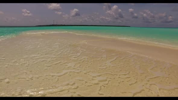 Aerial drone scenery of perfect resort beach voyage by blue water and white sandy background of a da