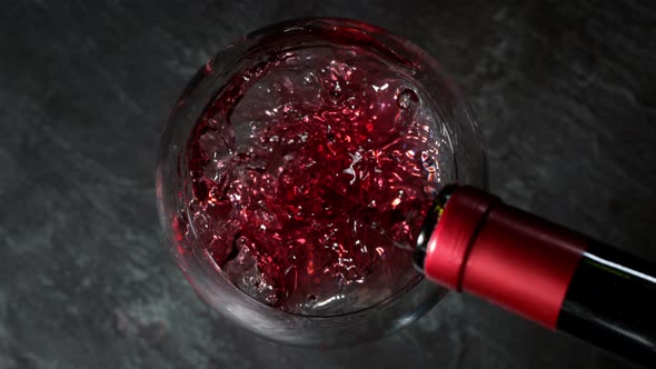 Super Slow Motion Shot of Pouring Red Wine Into Glass at 1000Fps