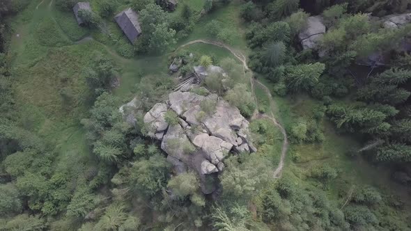 Stone rocks Ternoshorska Lada amidst beautiful scenic Carpathian forests, Ukraine