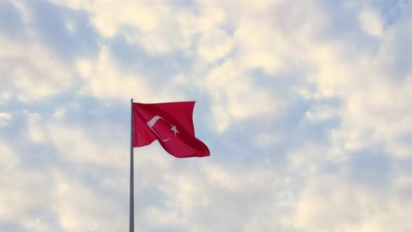 Turkish Flag Waving in Blue Sky
